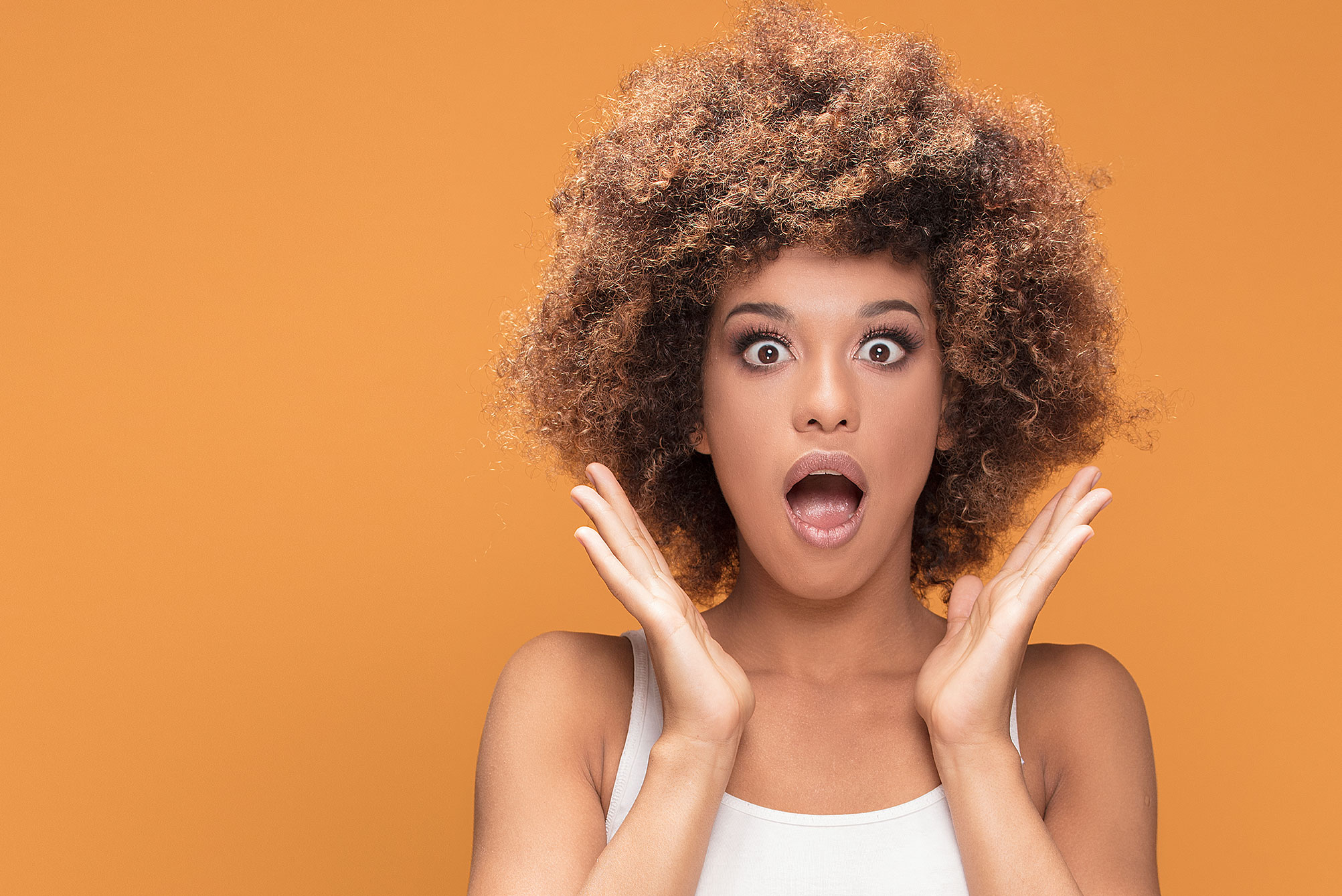 oshot image of woman with surprised look on face